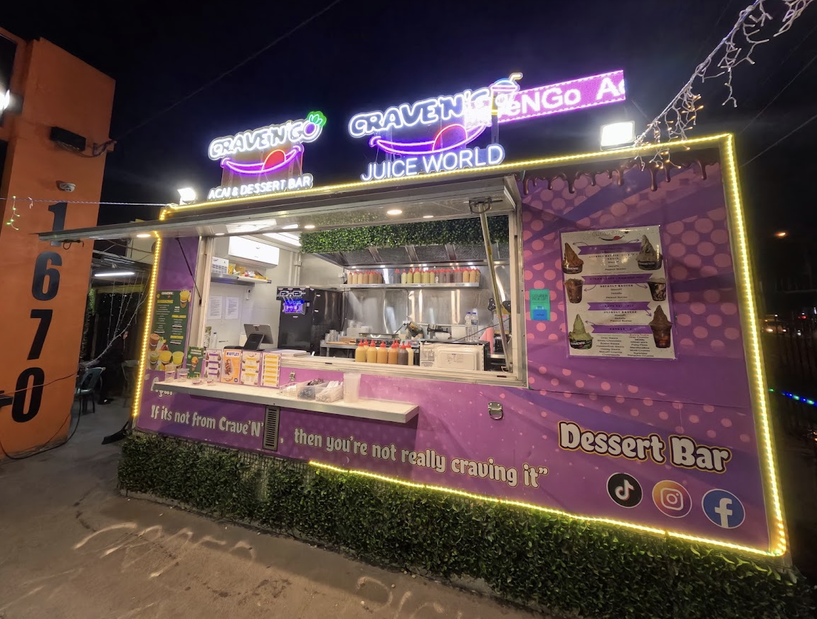 Crave 'N' Go acai & dessert bar food truck lit up at night